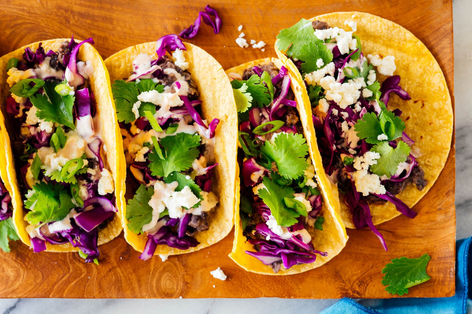 Cabbage Slaw Tacos with Black Beans & Feta
